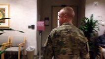 Soldier surprises his father at work after returning home from 10-month deployment.