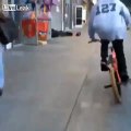 BMX riders bunny hopping homeless people in LA for fun