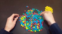 Learn Colours with Surprise Eggs and a Candy Skittles Rainbow!