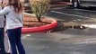 Woman hits man, gets hit back, feels victimized. Vertical video warning