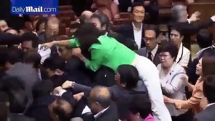 Chaos as Japan military bill approved