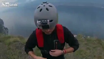 Man Jumps 1000 Feet With Parachute, But Hits The Side of The Cliff