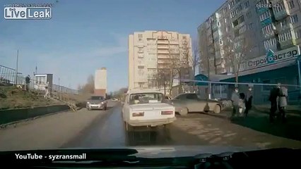 Russian Woman HIT by a car while speaking on Phone