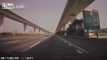 Speeding car on motorway takes out another and flips