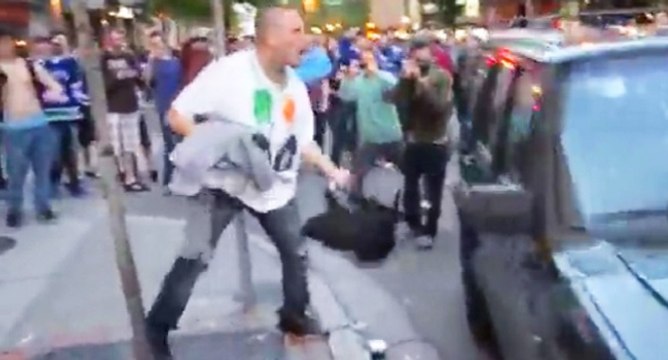 Un abruti veut briser une vitre