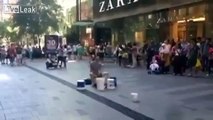 Street Drummer gets his Buckets Tackled by Idiot