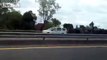Motorcycle Rider Does Insane Stunt in Traffic