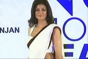 Sushmita Sen walks the ramp in a white sleeveless saree blouse