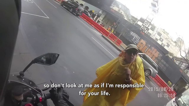 Racist lady goes angry at mean looking motorcycle driver