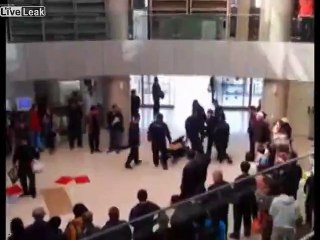 Woman strips her shirtless at hospital lobby