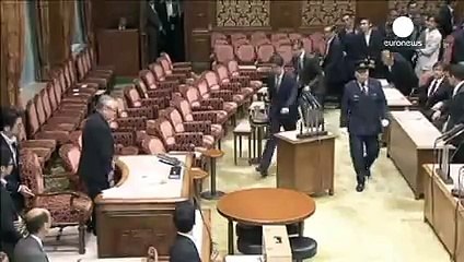 Unusual clashes erupt in Japan parliament over security bills