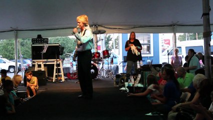 Gene Hodge sings at the tent Elvis Week 2015