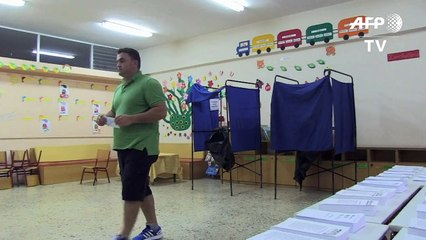 Greeks head to the polls in knife-edge election