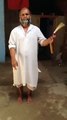 Old man acting Bruce Lee’s nunchaku scene