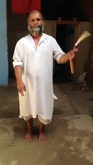 Old man acting Bruce Lee’s nunchaku scene