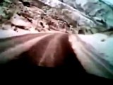 LiveLeak.com - SUV slides gracifully over the cliff