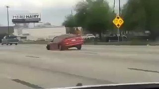 Three Wheel Mustang On Highway