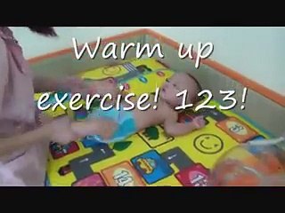 Triplets' first swimming lesson