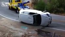 Overturned car gets overturned..