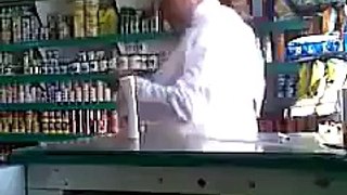 burglar stealing cashier