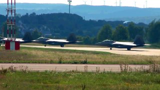 Four USAF F-22 Raptors from the 95th Fighter Squadron take off from Spangdahelm Air Base, Germany