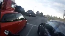 Driver tries to show up biker and instantly regrets it