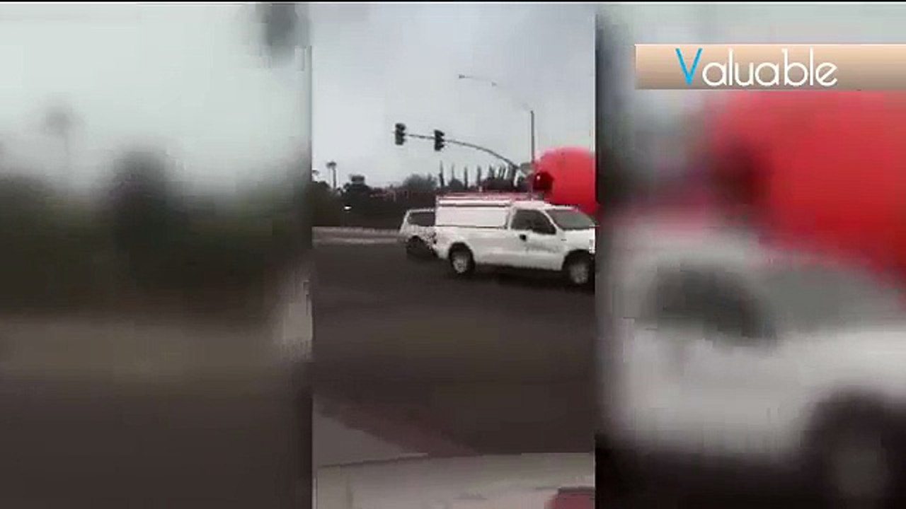 Storm gusts blow giant, inflatable Halloween pumpkin through Peoria