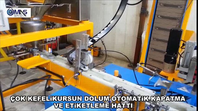 ÇOK KEFELİ KURŞUN DOLUM OTOMATİK KAPATMA VE ETİKETLEME HATTI