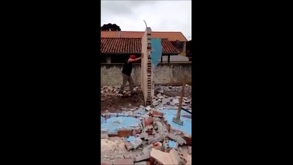 Dumb guy destroying a wall.. Funny fail