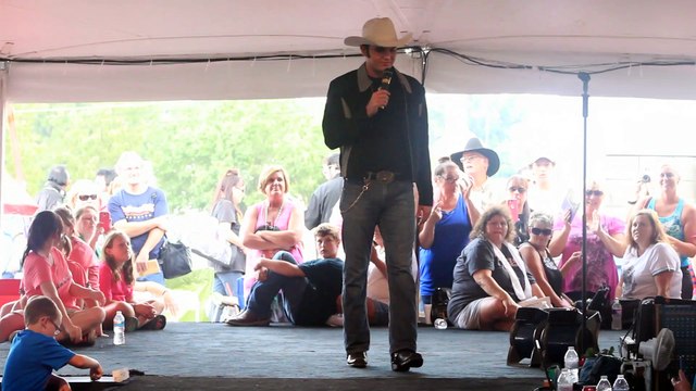 Cody Slaughter thanks Danny and Layna McCorkle at the tent Elvis Week 2015