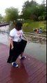 Skinny Guy Tries Pushing A Fat Girl Into Water