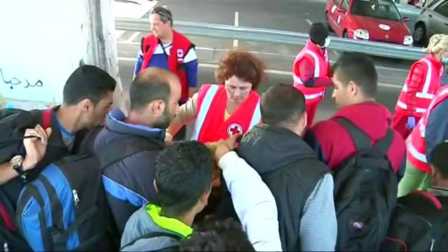 Migrants and refugees head to border of Austria by foot