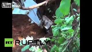 India: Elephant saved by digger after falling down abandoned well