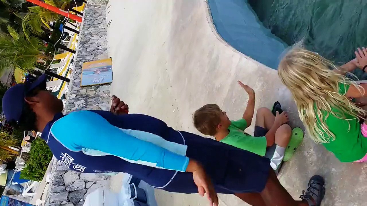 Our Beautiful Children playing with dolphins!!