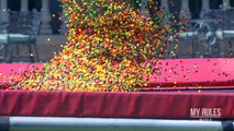 Playmate of the month 2015 Ana Cheri jumps on trampoline with thousands of skittles. SLOW MOTION!