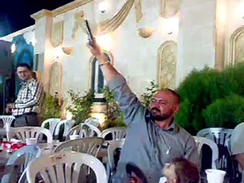 Kid shoots father at wedding.