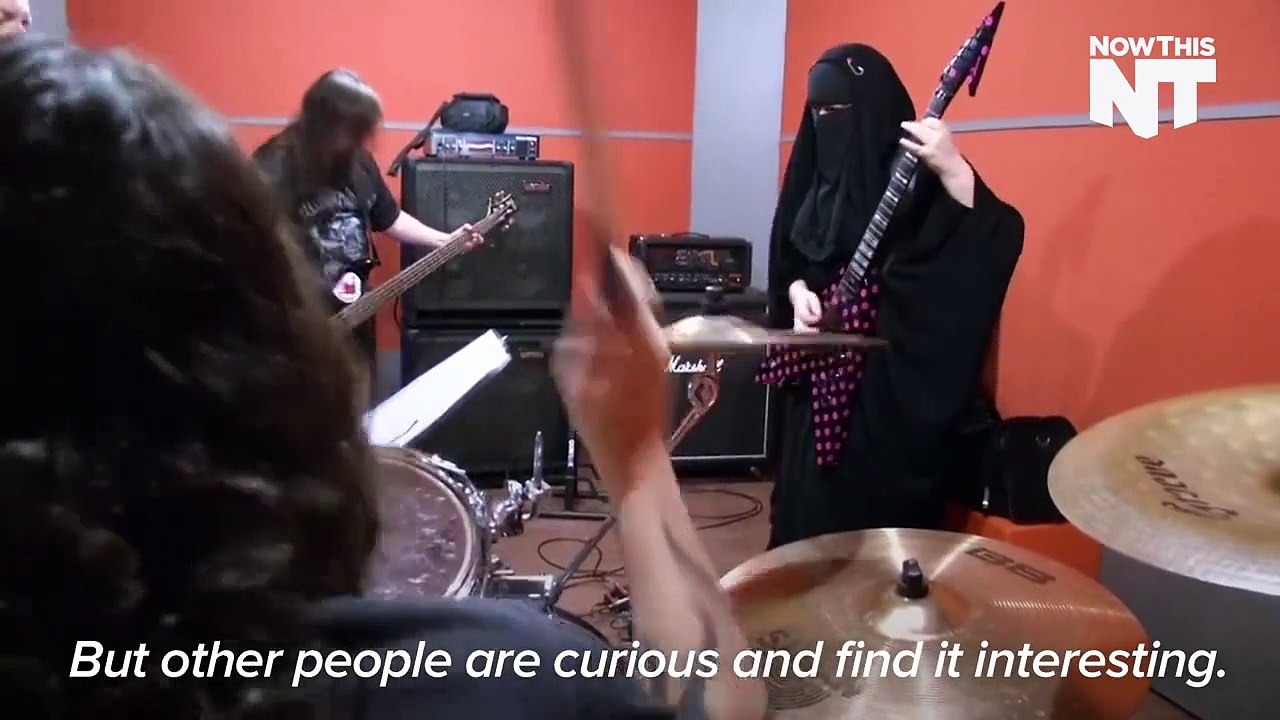 Muslim Woman Wears A Burqa — And Plays heavy metal Guitar