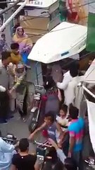 Women Beating Rikshaw driver -(watch on mute)