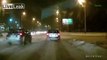 LiveLeak.com - Audi driver cuts through traffic and takes to a snow drift to avoid hitting cop car