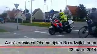 Obama's cars drive through Noordwijk NSS2014