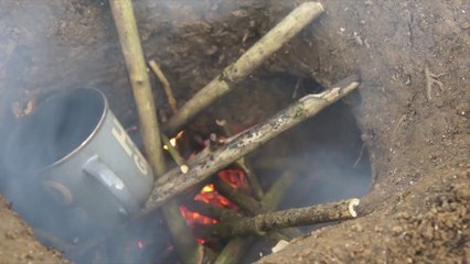 British guy shows how to build an invisible Fire in the Forest - dakota fire hole