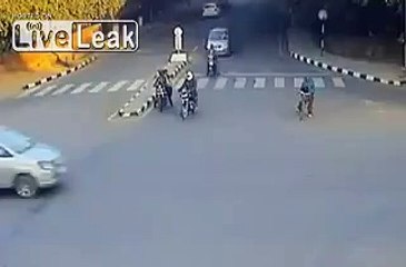 Car gets slammed, takes out bicyclist