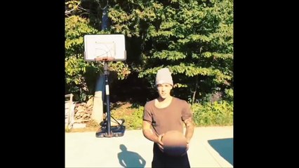 Justin Bieber does a trick with a basketball & his grandfather Bruce in Canada - August 31, 2014