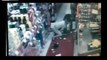 LiveLeak.com - Man robbing a store quickly forgets about one of the costumers...big mistake