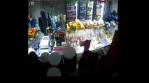 LiveLeak.com - Angry Russian Storekeeper Chases Robbers from Store