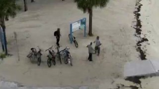 LiveLeak.com - Beach Bum Slapdown  --  Even bums can be territorialy protective