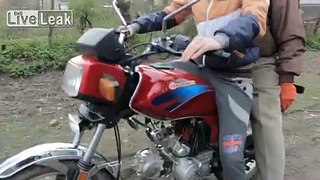 Father of the Year Candidate Tries to Teach Daughter to Ride Motorbike