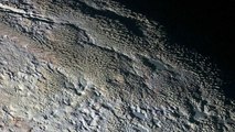 Behold Snakeskin-Like Terrain In Latest Pluto Images