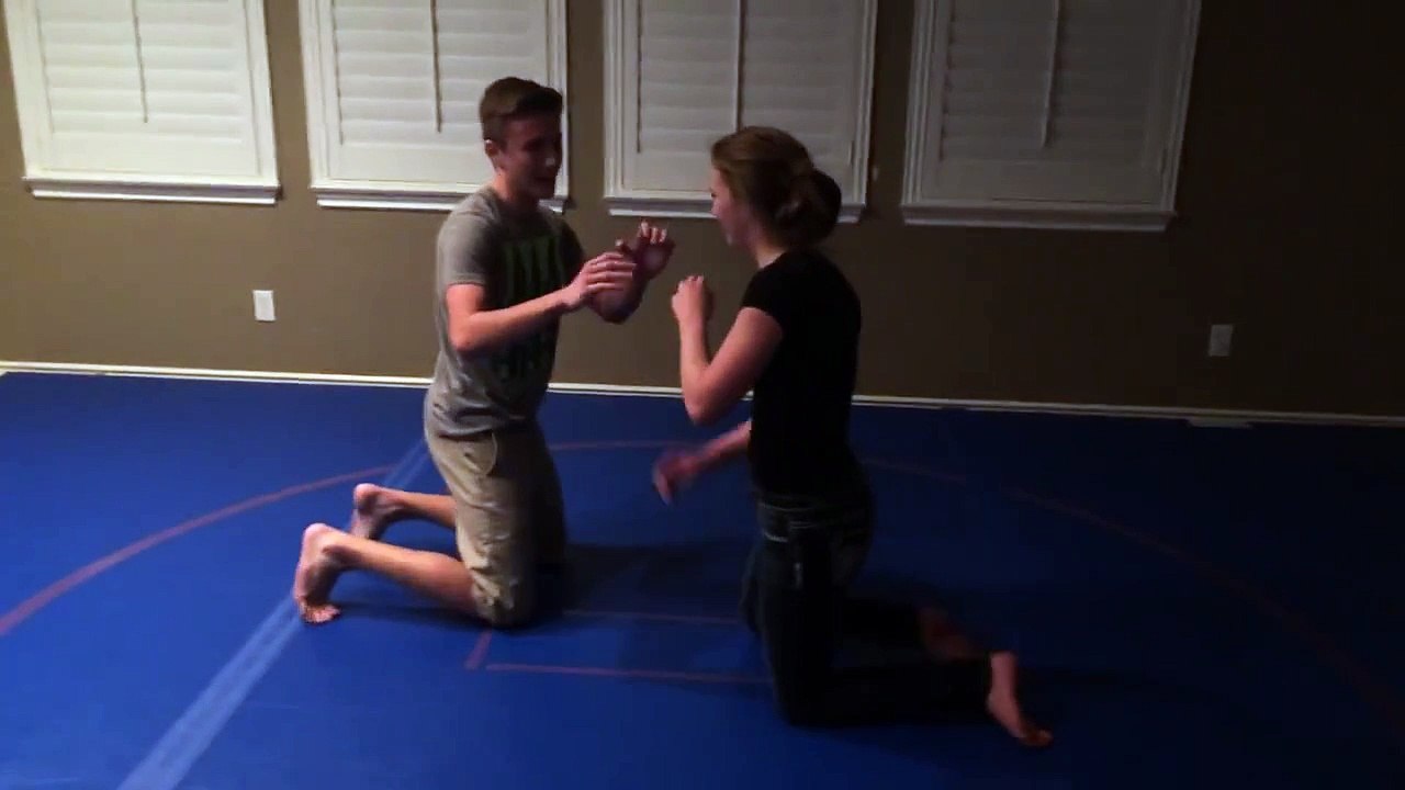 15 Year Old Girl Puts Boy to Sleep with Triangle Jiu Jitsu