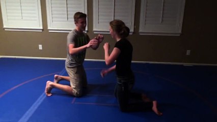 15 Year Old Girl Puts Boy to Sleep with Triangle Jiu Jitsu